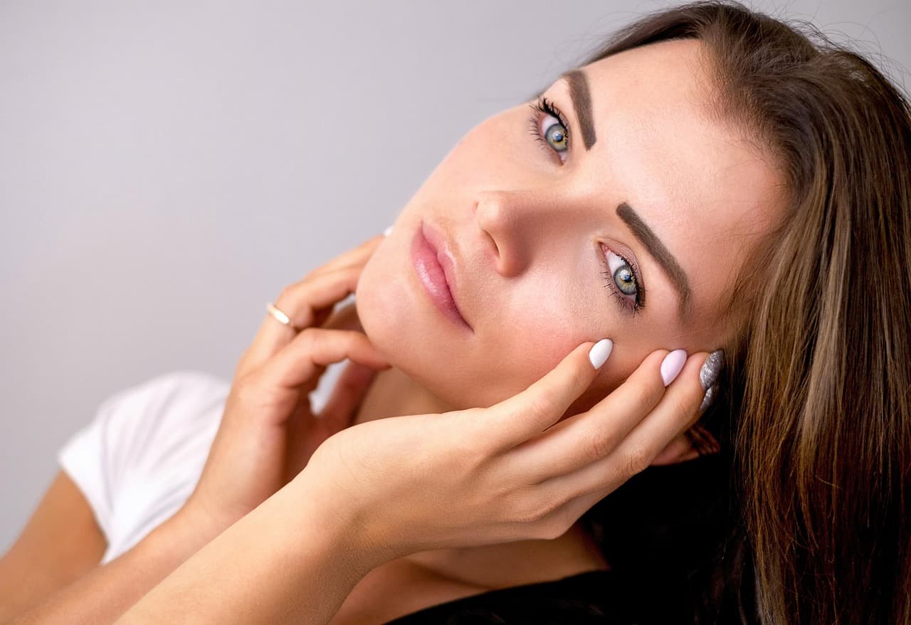 Softly tinted, shaped brows and natural make-up
